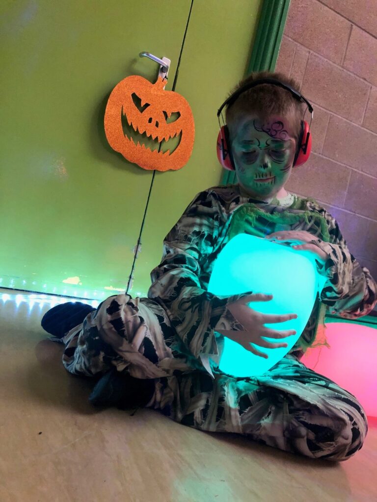 Sensory play enhances children's well-being by regulating emotions, reducing stress, and promoting relaxation.